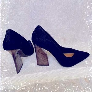 Black suede pumps by Halston.